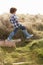 Young Boy Going For Walk In Wellington Boots