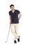 Young boy with golf stick in hand.