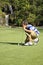 Young boy golfing