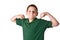 Young boy in a green polo shirt flexing