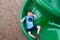 Young Boy on Green Slide