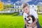 Young Boy and His Dog in Front of House