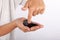 Young boy holding a black slime in his hand