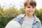 Young boy holding soccer ball