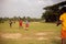 Young boy kicks off the ball for the penalty shot for a goal. Children playing and practicing soccer game