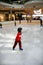 Young boy learning to skate