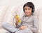 Young boy listening music headphone