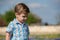 Young Boy Outside in Field