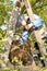 Young boy picking apples