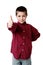 Young boy in plaid shirt giving thumbs up