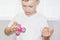 Young boy play with fidget spinner stress relieving toy. Popular toy