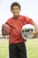 Young Boy Playing American Football