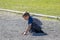 Young boy playing in the dirt in summer