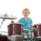 Young boy playing drums