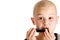 Young boy playing harmonica