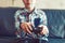 Young boy playing video game by controller closeup