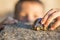 Young boy plays with toy car. Little boy playing with car toy on sunset