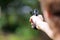 Young boy practice shooting guns on outdoor