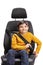 Young boy putting on a seat belt