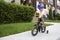 Young boy riding his bicycle