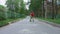 Young boy roller skating on the road