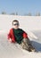 Young boy on sand dune