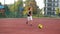 A young boy scores a goal during a penalty shoot out. slow motion. Outdoors. Sport it`s source to health life.