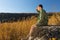 Young Boy Scout on Rock Watching Wide Field