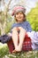 Young Boy Sitting In Laundry Basket