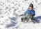 Young boy sledging