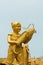 Young boy statue Hold golden fish