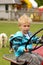 Young boy at the tractor