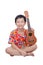 Young boy with ukulele over white