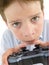 Young boy using videogame controller