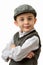 Young boy with vest and flat cap