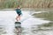 Young boy wakeboarding