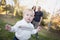 Young Boy Walking as Parents Look On From Behind