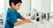 Young boy, washing hands and hygiene for health, sustainability and water at routine at home. Male child, bathroom and
