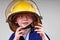 Young Boy Wearing Fireman\'s Helmet