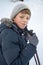 Young boy winter walking in mountains