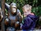 Young Boy at Zoo with Ape Statue