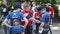 Young boys athletes stand on the street at a sporting event dedicated to Olympic Day