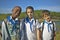 Young boys smiling and wearing school uniforms in Cuba