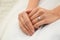 Young bride wearing beautiful engagement ring, closeup