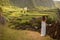 Young bride in white wedding dress on background of beautiful view of Flores island, Azores