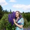A young brunette girl lupine meadow