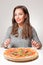 Young brunette having Italian food.