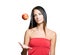 Young brunette juggling fresh apple.