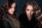 Young brunette twins women with perfect natural makeup and hair style wearing furs