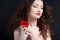 Young brunette woman and poppies